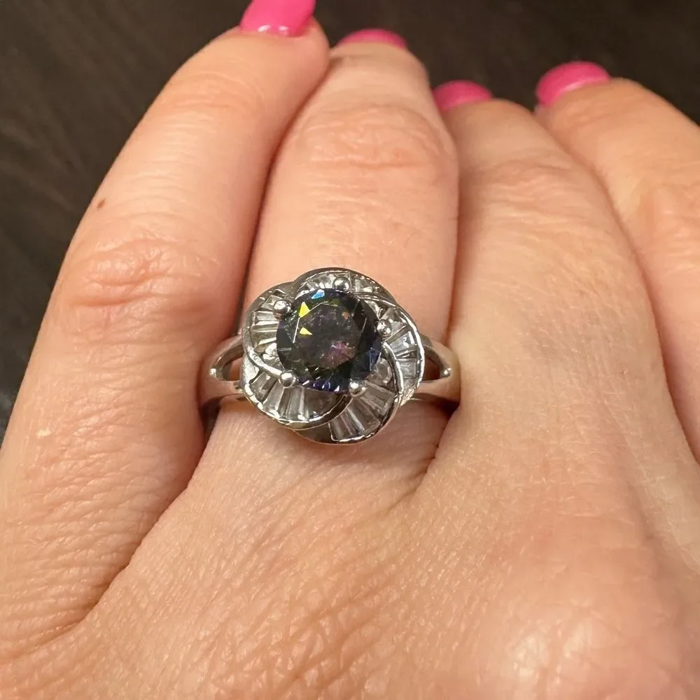 Stunning mystic topaz and swirl of cz baguettes in .925‎ ring!